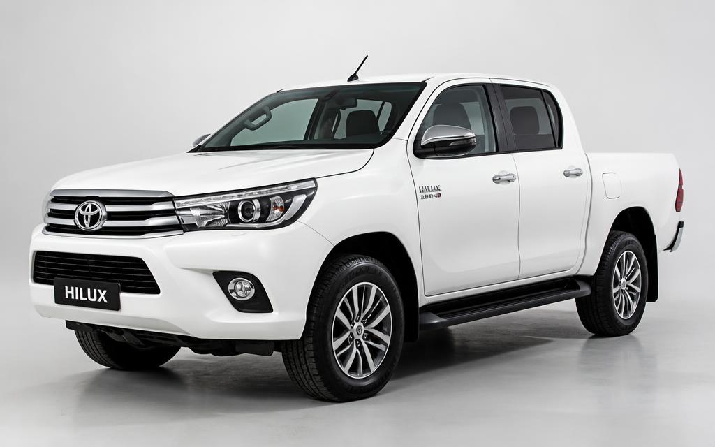 White Toyota Hilux available for rent in Karachi